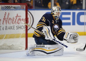 19 December 2015: Buffalo Sabres goalie Chad Johnson (31) makes a save during an NHL game between the Chicago Blackhawks and Buffalo Sabres at the First Niagara Center in Buffalo, NY. (Jerome Davis/Icon Sportswire)