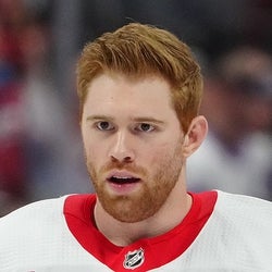 J.T. Compher headshot